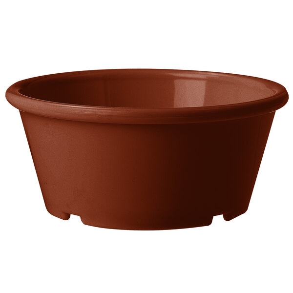 A brown plastic bowl with a white background.