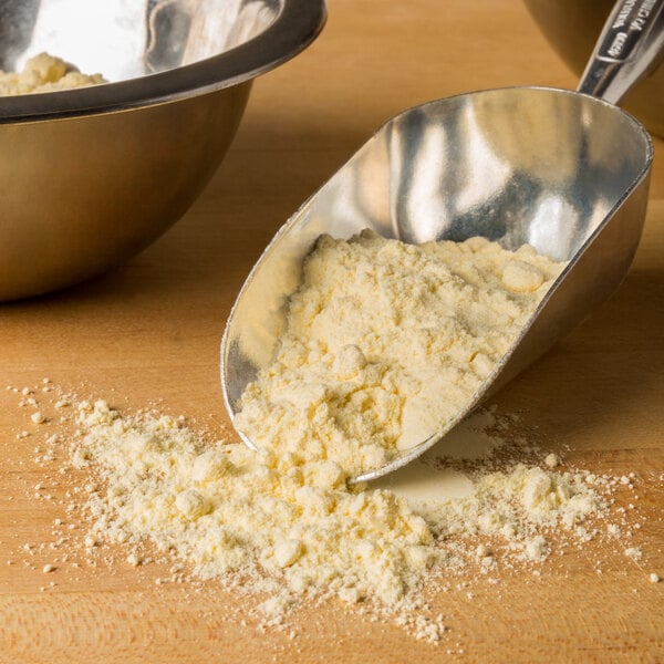 A scoop of Agricor yellow corn flour.