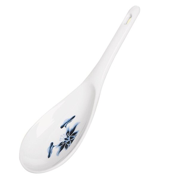A white ladle with a blue flower design on the end.