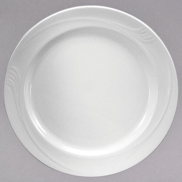 A Oneida cream white china plate with a swirl design.