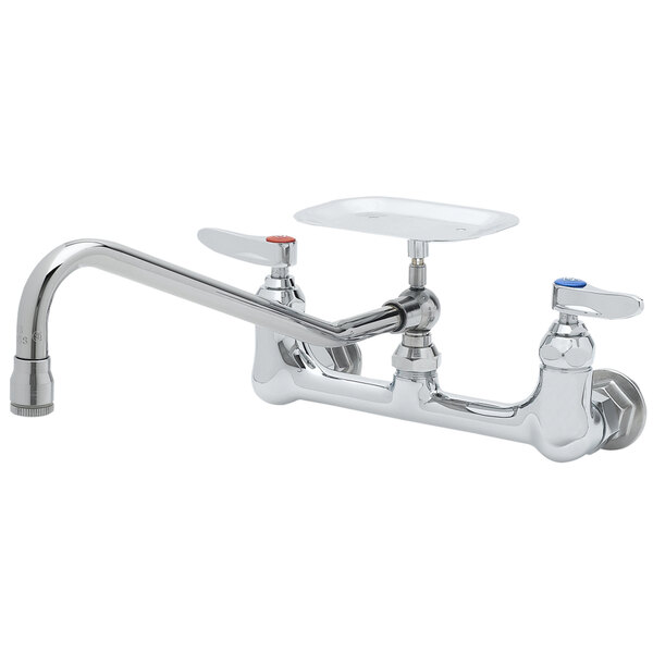 A chrome T&S wall mounted pantry faucet with soap dish and two handles.