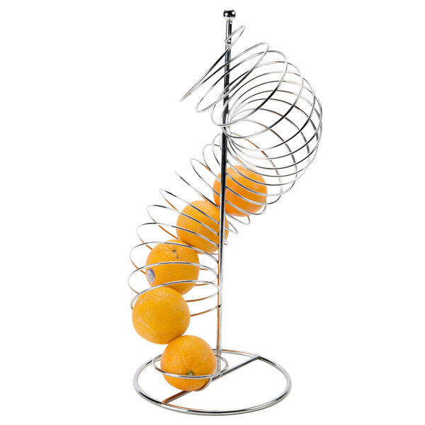 A Tablecraft chrome metal spiral fruit basket with oranges on it.