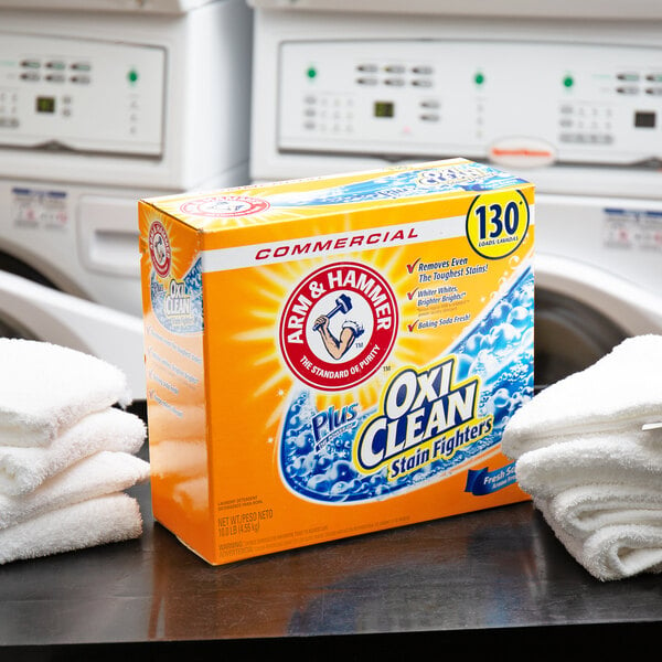 A box of Arm & Hammer Fresh Scent Powder Laundry Detergent Plus OxiClean on a white background.