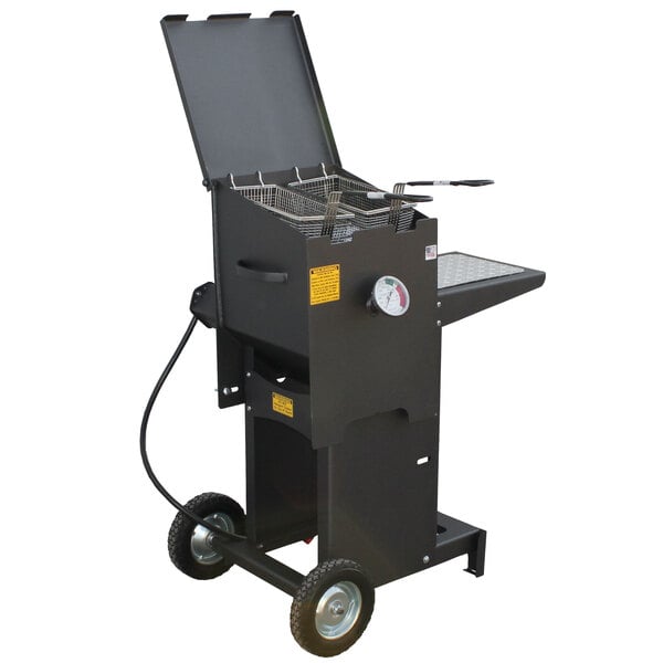 A black R & V Works outdoor deep fryer with wheels.