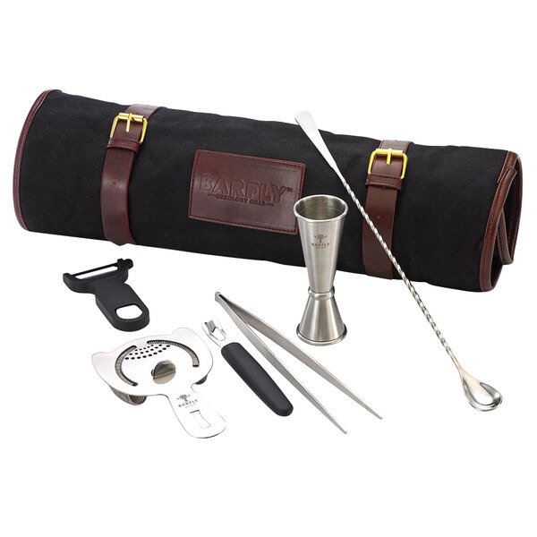 A Barfly stainless steel cocktail kit on a table with a black case.
