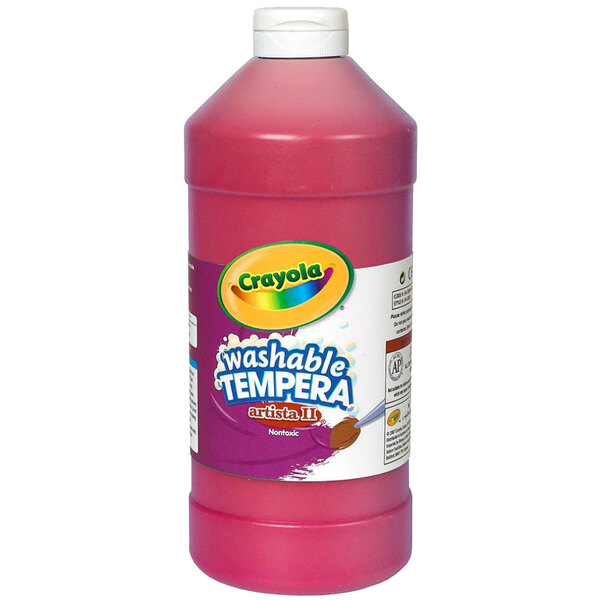 A close-up of a bottle of Crayola washable tempera paint with a pink label.