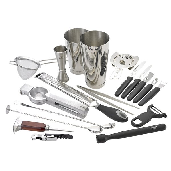 A Barfly stainless steel cocktail kit on a counter with silver containers and tools.