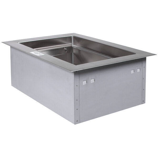 A stainless steel rectangular drop-in cold food well on a counter.