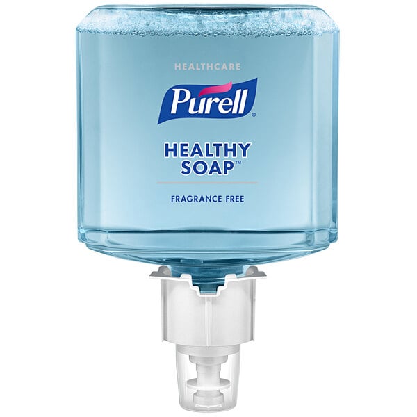 A Purell Healthy Soap dispenser with a clear container full of soap.