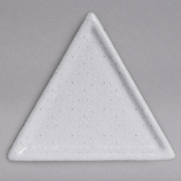 A white triangle-shaped G.E.T. Enterprises Bugambilia marble white granite resin-coated aluminum platter with a textured white surface.