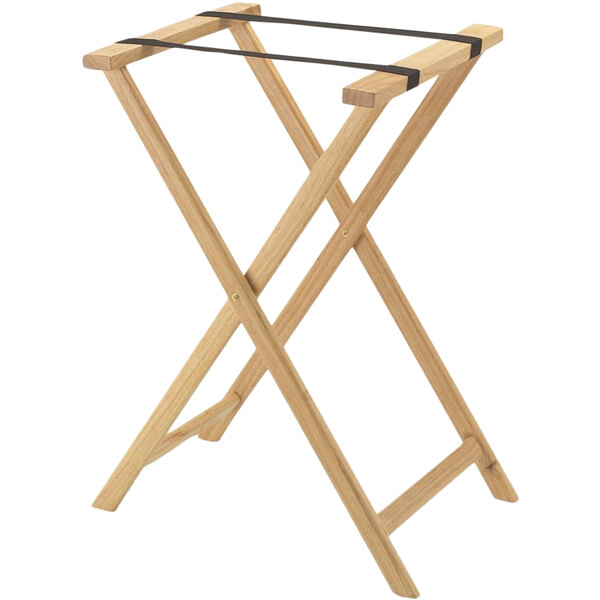 A wooden Aarco folding tray stand with black straps.