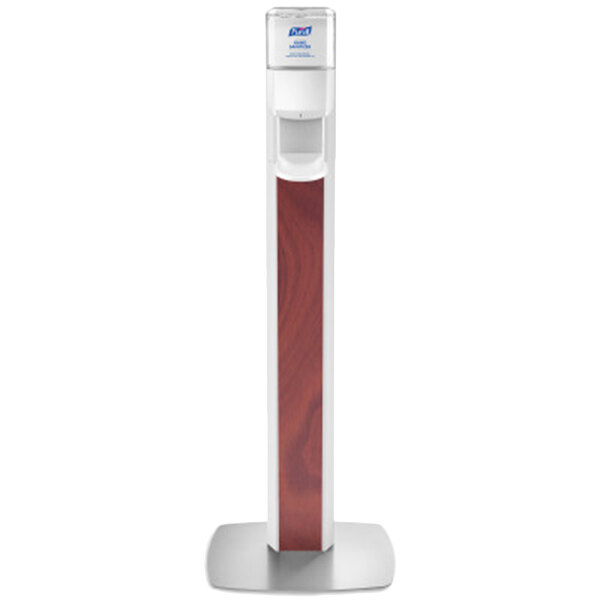A white rectangular hand sanitizer dispenser with a wood panel on the base.