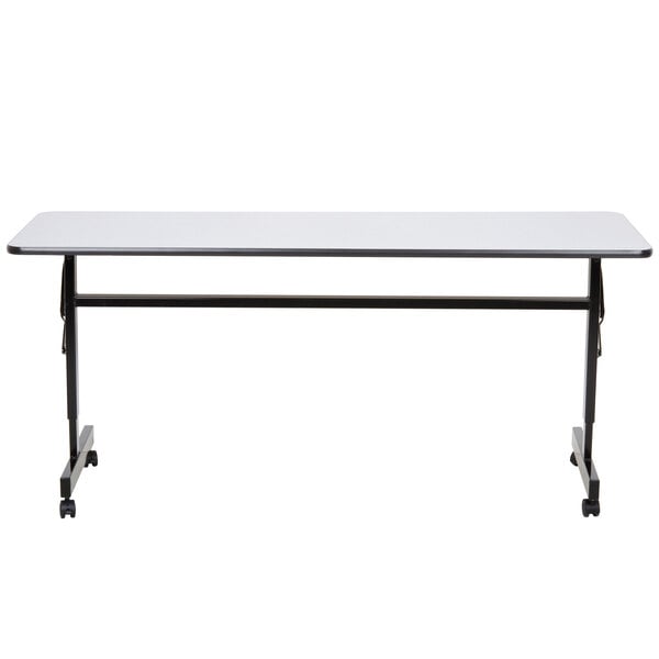 A white rectangular Correll EconoLine mobile flip top table with black wheels.