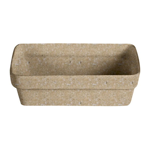 A rectangular sand granite G.E.T. Enterprises Bugambilia buffet bowl with a white speckled surface.