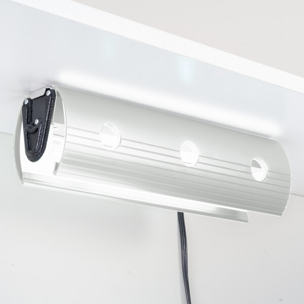 A Curtron Pest-Pro UC50 UV flying insect light on a white surface.