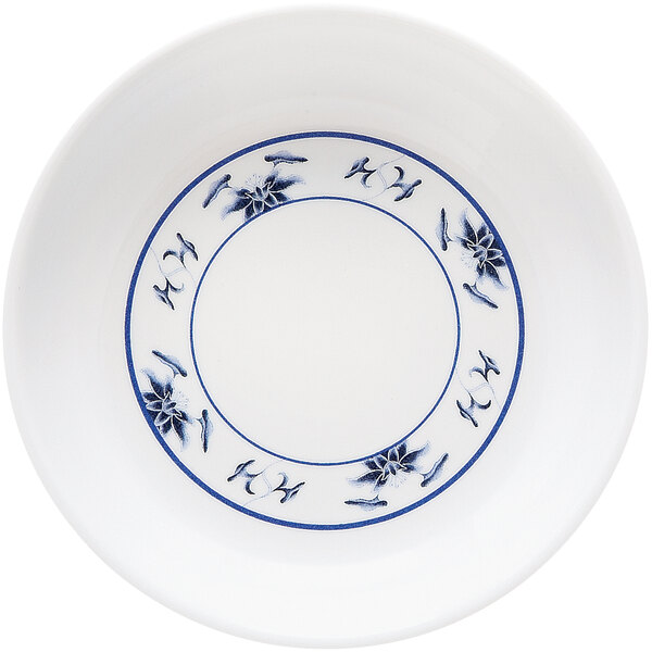 A white bowl with blue design.