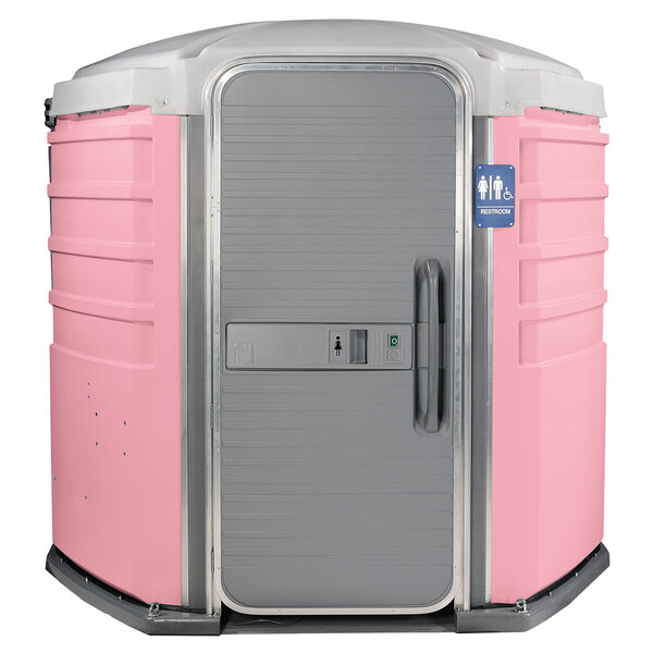 A pink and white PolyJohn wheelchair accessible portable restroom.