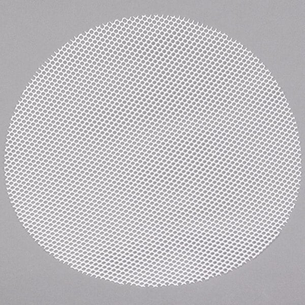 A white circle with small holes.