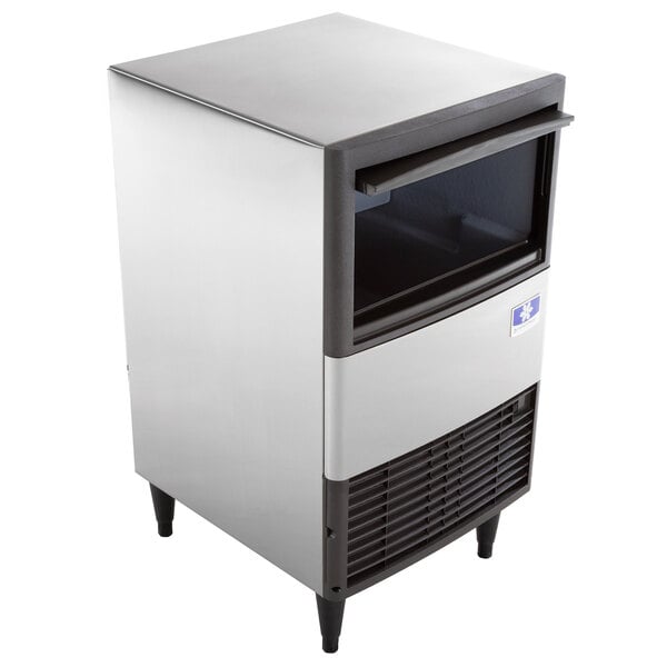 A silver Manitowoc undercounter ice machine with a black and silver rectangular bin.