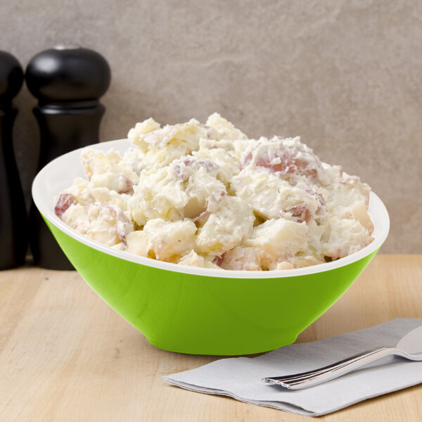 A green GET Keywest melamine bowl filled with potato salad.