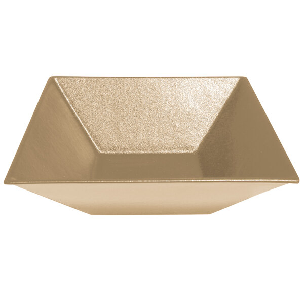 A G.E.T. Bugambilia metallic XL deep square bowl with a gold finish.