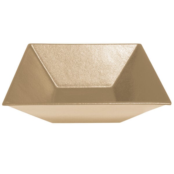 A shiny metallic hexagon-shaped bowl with a white resin-coated finish.