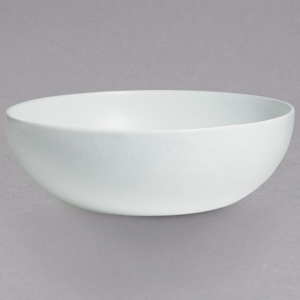 A white G.E.T. Enterprises Bugambilia resin-coated aluminum bowl.