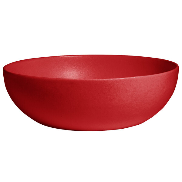 A cranberry red G.E.T. Enterprises Bugambilia deep round bowl with a smooth finish.