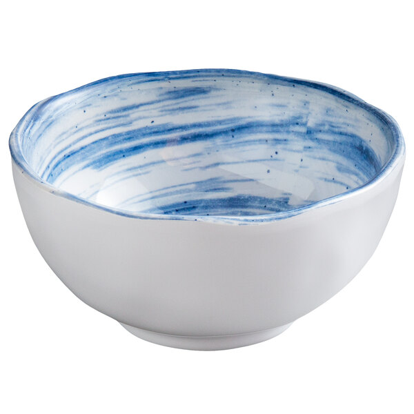 A white melamine bowl with blue and white stripes.
