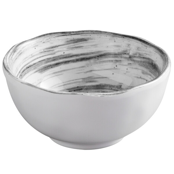 A white melamine bowl with black swirls.