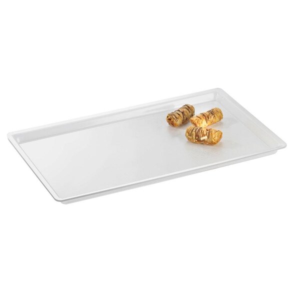 A clear rectangular Cal-Mil tray with food on it.