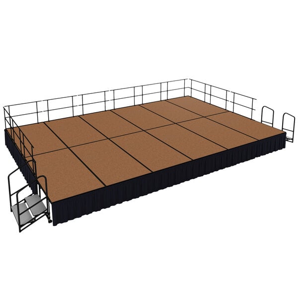 A National Public Seating stage with brown hardboard squares and black railings.