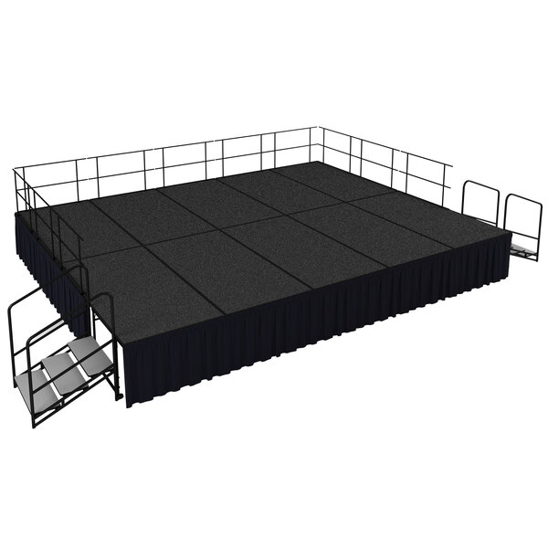 A black stage with black curtains and metal railings.