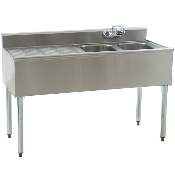 An Eagle Group stainless steel underbar sink with two bowls and a left drainboard.