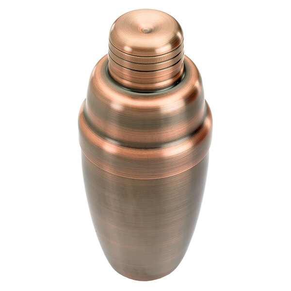 A close-up of a Barfly antique copper cocktail shaker with a lid.