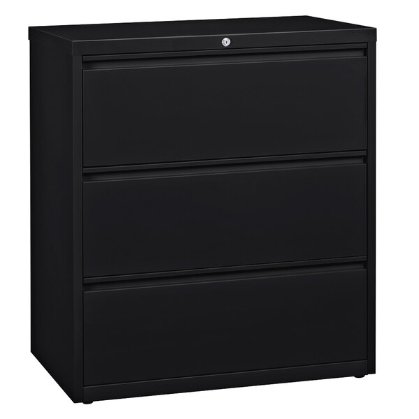A black Hirsh Industries three-drawer lateral file cabinet with a white handle.