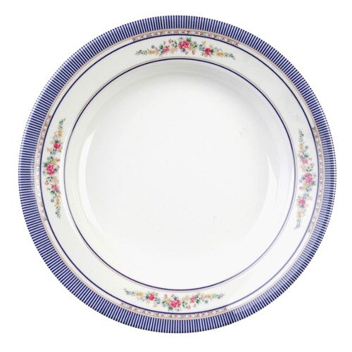 A white melamine soup plate with blue trim and a rose design.