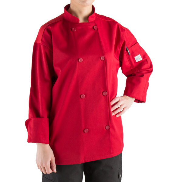 A person wearing a red Mercer Culinary Millennia Air chef coat with full mesh back.