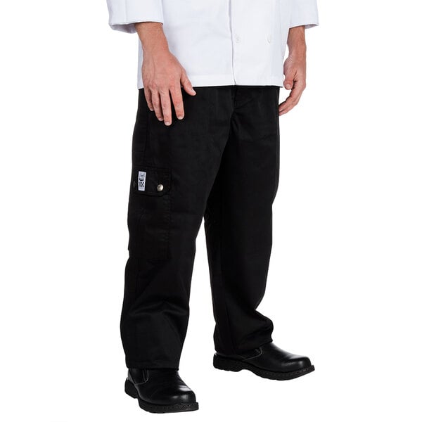 A man wearing Chef Revival black cargo pants and a white chef coat.