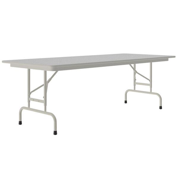 A white rectangular Correll folding table with metal legs.
