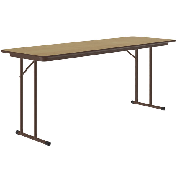 A Correll rectangular seminar table with metal legs.