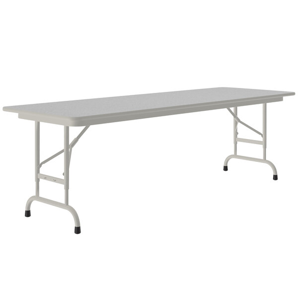 A white rectangular table with gray legs.