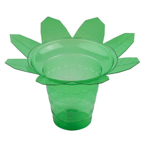 A green transparent plastic palm tree shaped snow cone cup.