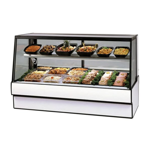 A Federal Industries refrigerated deli case full of food.