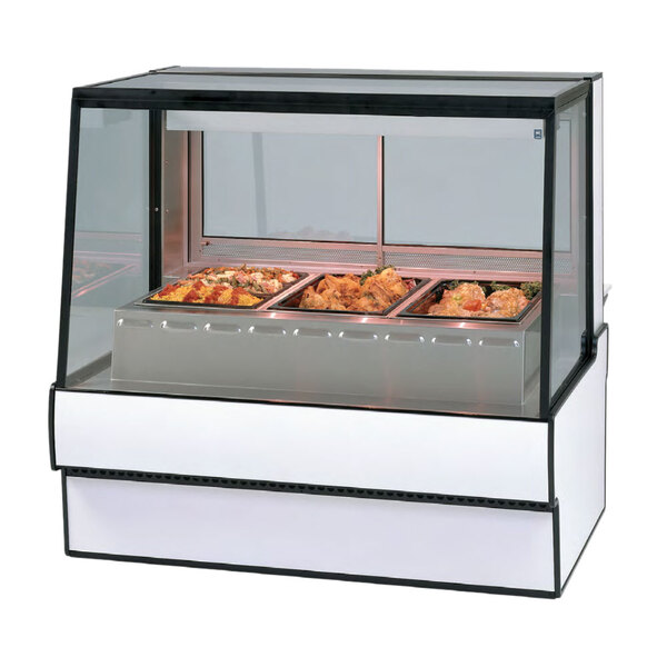 A Federal Industries heated deli display case with food on trays.