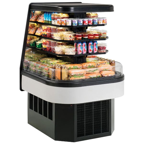 A black Federal Industries air curtain end cap merchandiser with food displayed inside.