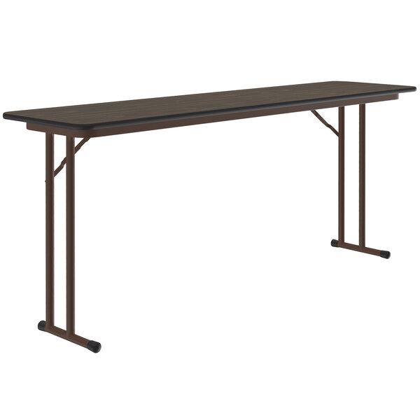 A Correll rectangular seminar table with a black top and brown legs.