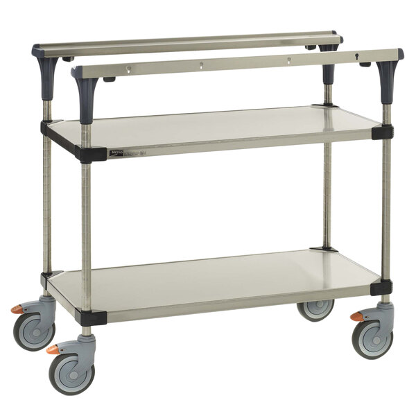 A Metro stainless steel portable work table with wheels.