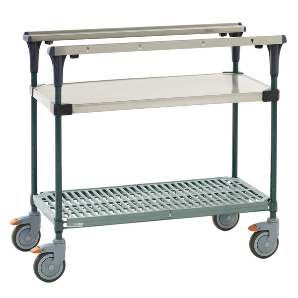 A stainless steel Metro PrepMate Multistation cart with wheels and two shelves.