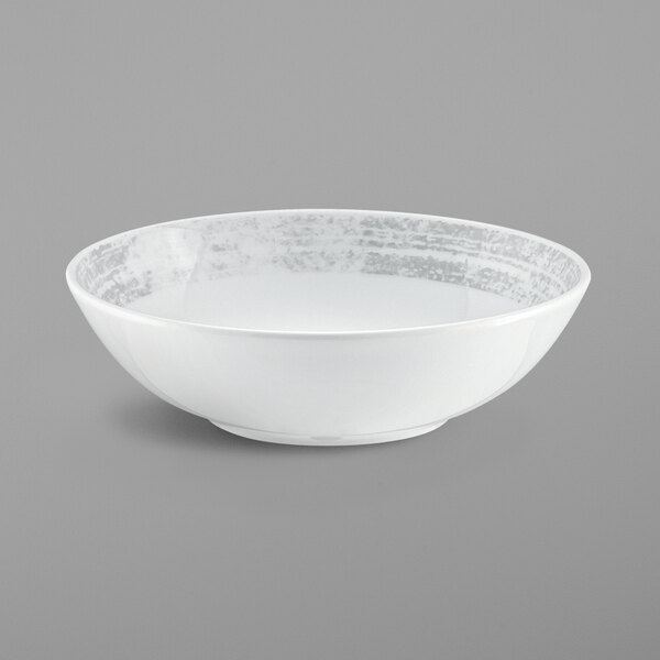 A white porcelain bowl with a grey shabby chic design.